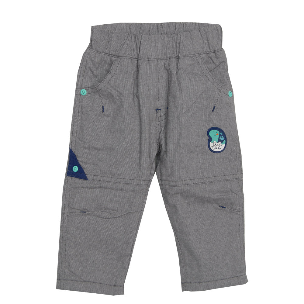 
  Children's clothing line Tuc Tuc pants with bag, sweatshirt inside.
  Front and back pockets.
...
