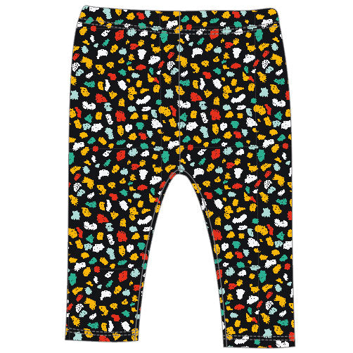 Leggins from the Tuc Tuc girl's clothing line, with an all over multicolor pattern on a black bac...