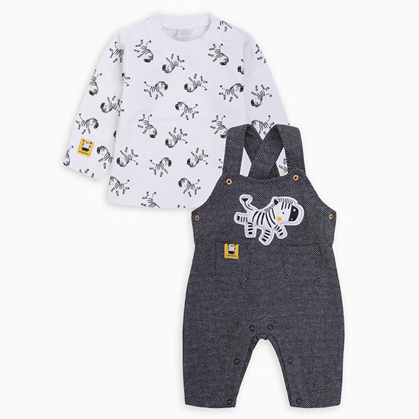 
  Overalls from the Tuc Tuc Children's Clothing Line buttoned at the bottom with pocketon
  on t...