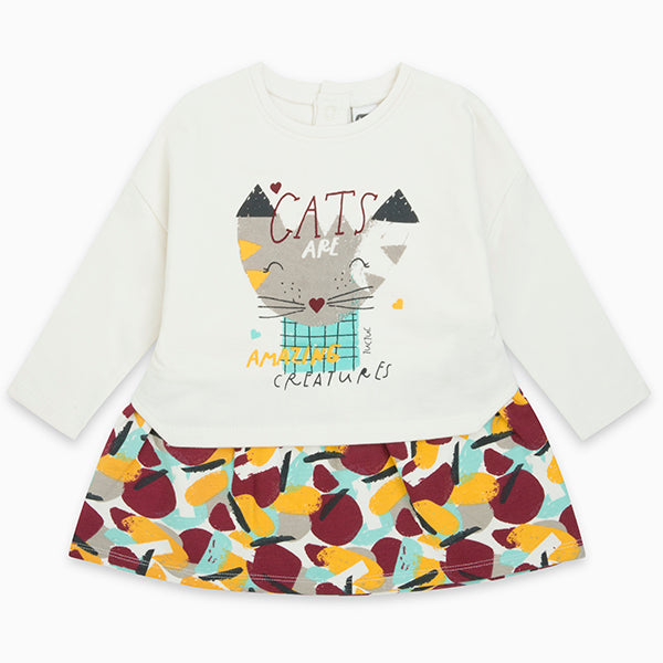
  Sweatshirt dress from the Tuc tuc children's clothing line with snap buttons
  on the back.


...