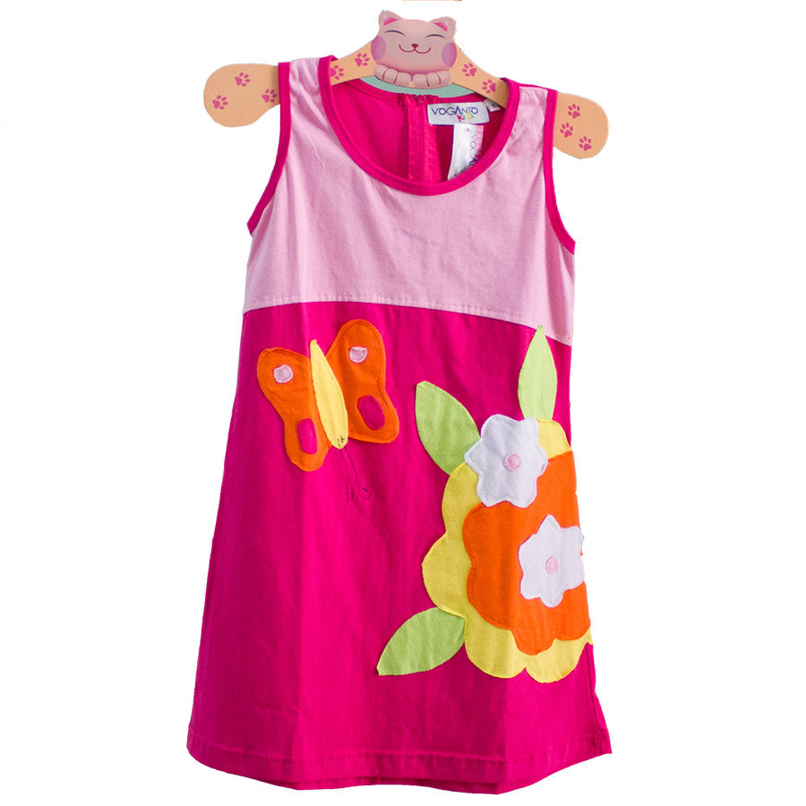 
  Little dress from the Voganto Kids clothing line, flared vest model
  with applications of col...